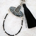Sodamye Najeon Gat keyring with black tassel on white fur