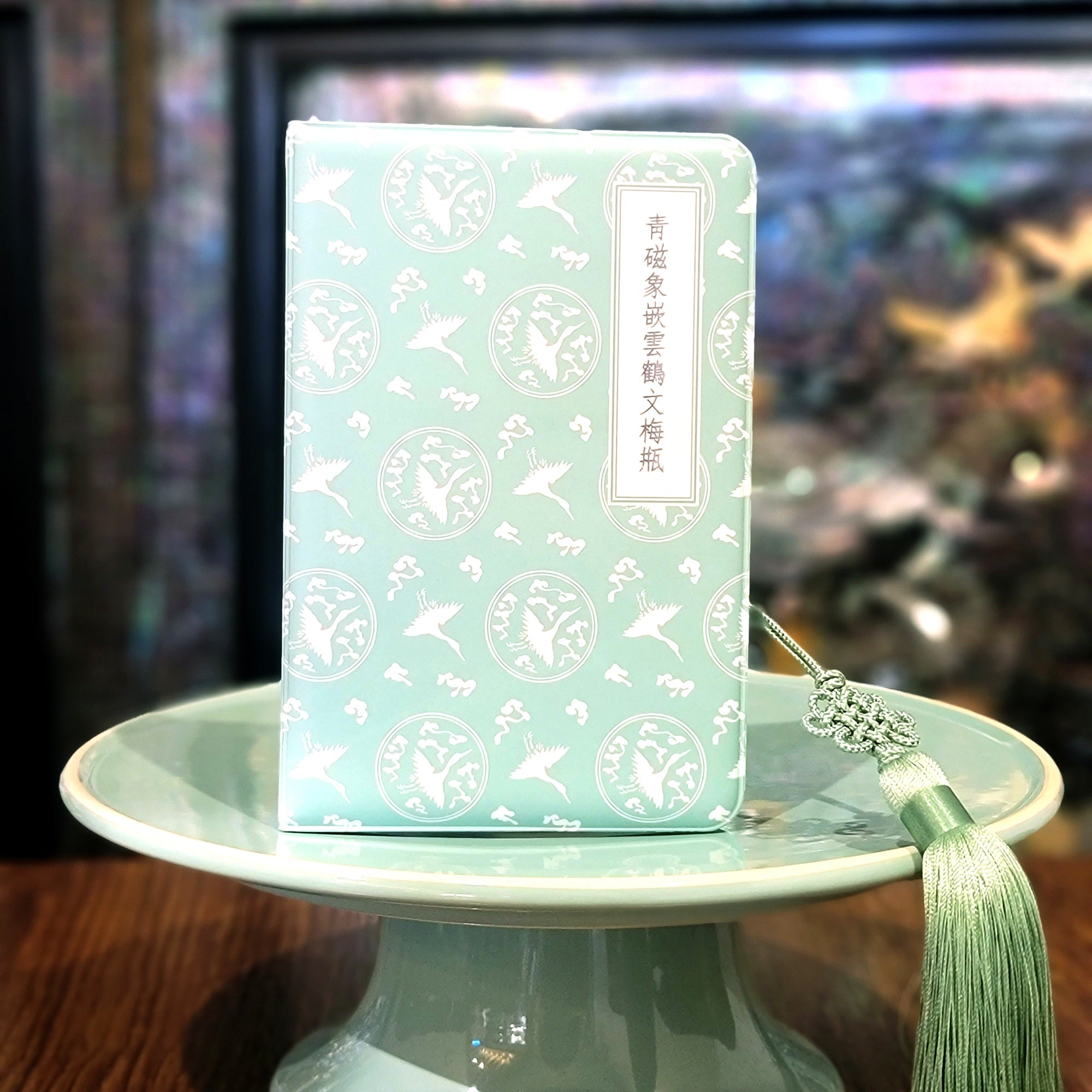 Yeokmundan Goryeo Celadon passport case on celadon stand